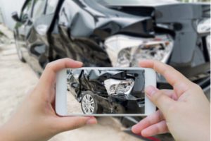 taking photo of car accident scene